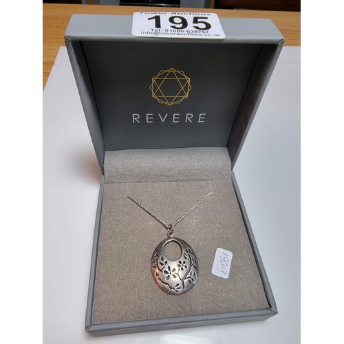 195 - A pretty 925 silver pierced pendant with a floral design fitted in its original box on an 18