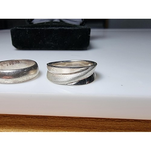 199 - A bundle of 3x 925 silver plain band rings, all in good clean condition and boxed. One is size J, tw... 