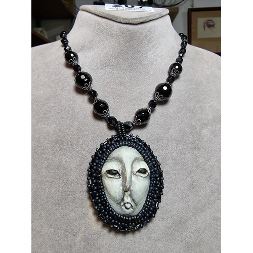 207 - A large collection of unusual gothic jewellery to include an unusual black crystal necklace with a c... 