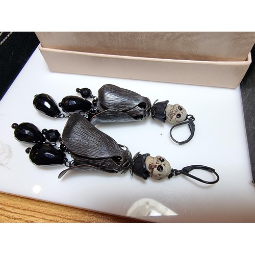 207 - A large collection of unusual gothic jewellery to include an unusual black crystal necklace with a c... 