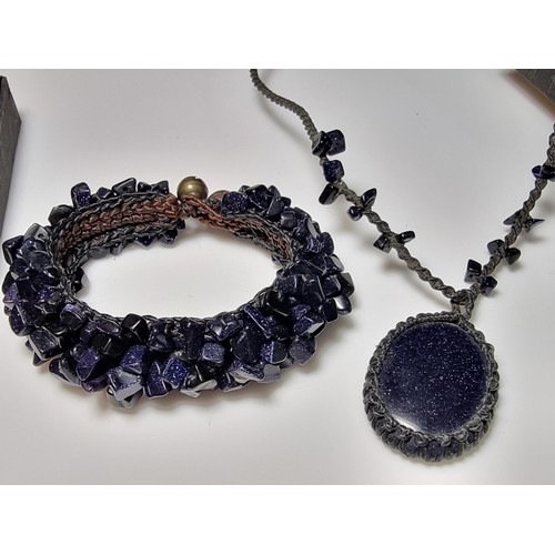 207 - A large collection of unusual gothic jewellery to include an unusual black crystal necklace with a c... 