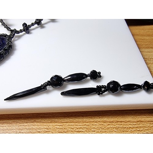 207 - A large collection of unusual gothic jewellery to include an unusual black crystal necklace with a c... 