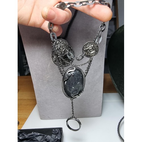 207 - A large collection of unusual gothic jewellery to include an unusual black crystal necklace with a c... 