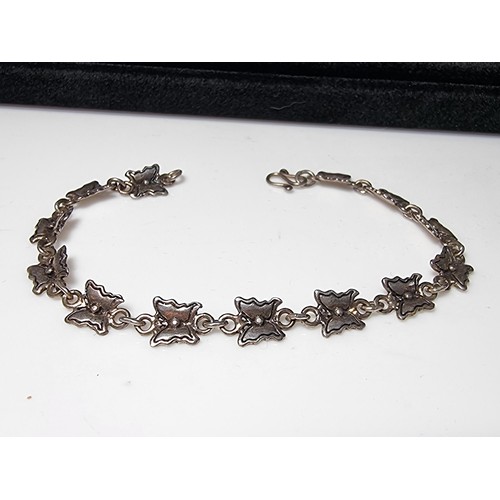 209 - A pretty 925 silver butterfly formed panel bracelet in excellent clean condition, boxed. Length of 7... 