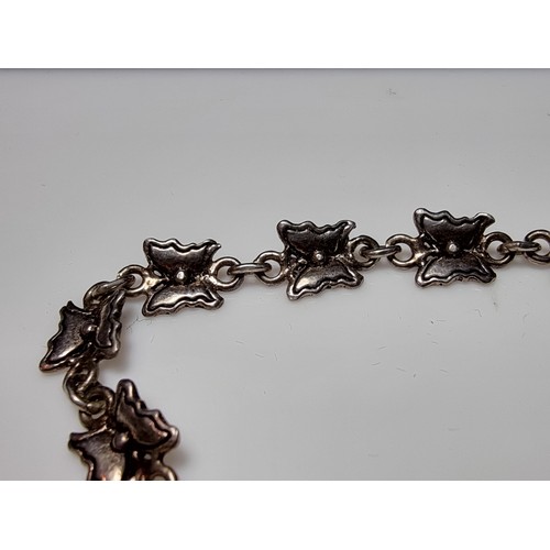 209 - A pretty 925 silver butterfly formed panel bracelet in excellent clean condition, boxed. Length of 7... 