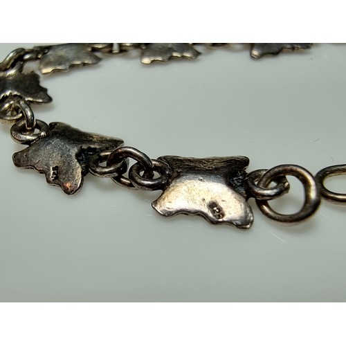 209 - A pretty 925 silver butterfly formed panel bracelet in excellent clean condition, boxed. Length of 7... 