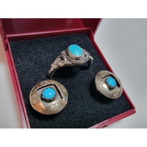 212 - A matching 925 silver jewellery set to include a pair of stud earrings inset with turquoise stones a... 