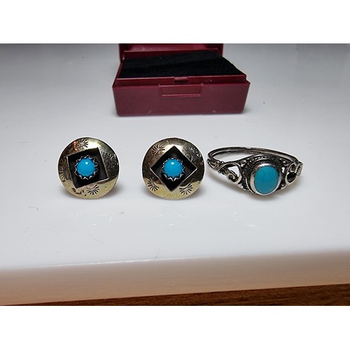 212 - A matching 925 silver jewellery set to include a pair of stud earrings inset with turquoise stones a... 