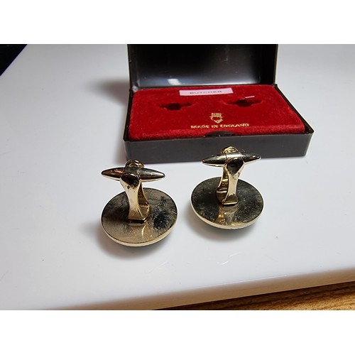 217 - A pair of vintage gilt cufflinks both inset with a genuine fishing fly, cased and ideal for a fisher... 