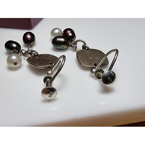 222 - A pair of 925 silver screw back drop earrings inset with 3 genuine pearls on each, in excellent clea... 