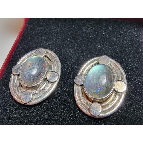 224 - A pair of pretty 925 silver stud earrings inset with stunning spectrolite stones with excellent flas... 