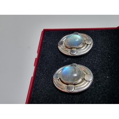 224 - A pair of pretty 925 silver stud earrings inset with stunning spectrolite stones with excellent flas... 