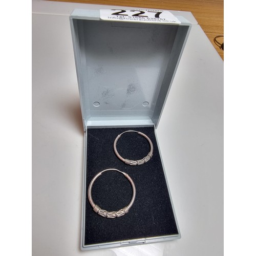 227 - A pair of 925 silver hoop earrings, in good clean condition and boxed, diameter of the earring is 3c... 