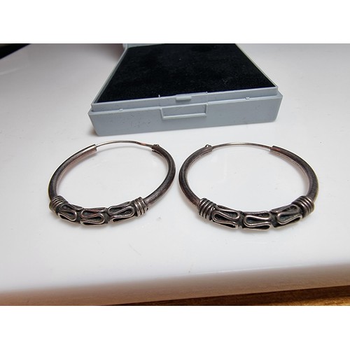 227 - A pair of 925 silver hoop earrings, in good clean condition and boxed, diameter of the earring is 3c... 