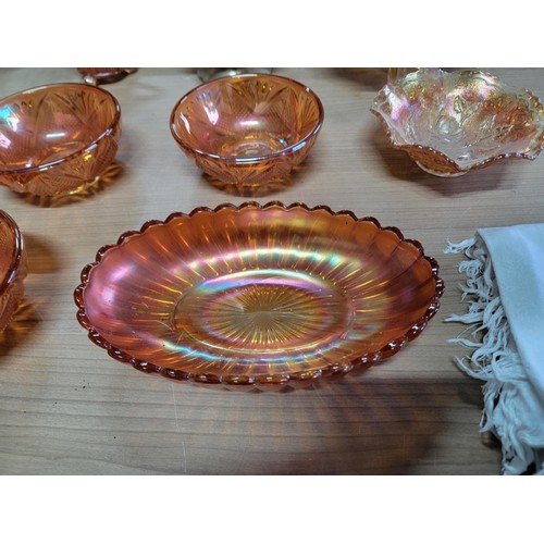 368 - 11x pieces of carnival glass inc 5 bowls, 3 legged fruit bowl largest piece stands at 9cm high 19cm ... 