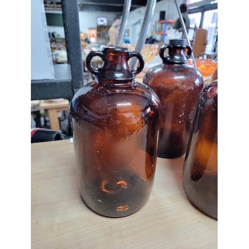 384 - Quantity of 6x amber coloured demijohns in good order