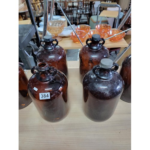 384 - Quantity of 6x amber coloured demijohns in good order