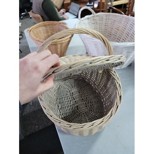 429 - 3x wicker baskets inc a wicker hamper in good order largest basket measures 24cm by 58cm