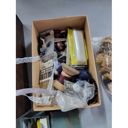 431 - Large quantity of sewing accessories in one wooden box and a wicker basket inc a large quantity of w... 