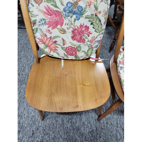 476 - Set of 4 Ercol spindle back dining chairs with carved swan in backs, with floral seat pads all in go... 