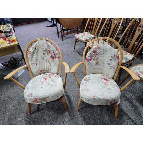 477 - Pair of Ercol low slung easy arm chairs in blonde with both seat and back pads, both in fine sturdy ... 