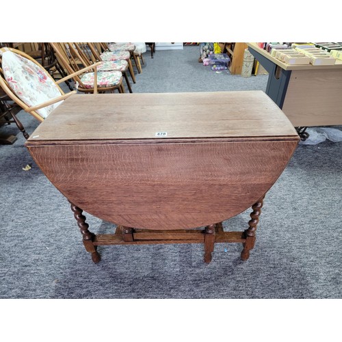 478 - Oak barley twist gate leg table giving great patina and of sturdy construction