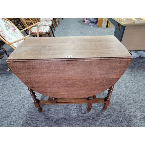 478 - Oak barley twist gate leg table giving great patina and of sturdy construction