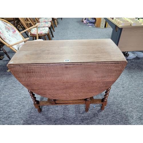 478 - Oak barley twist gate leg table giving great patina and of sturdy construction