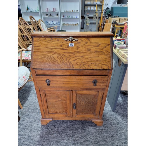 479 - Oak bureau of smaller dimensions being 98cm high 68cm wide and 27cm deep