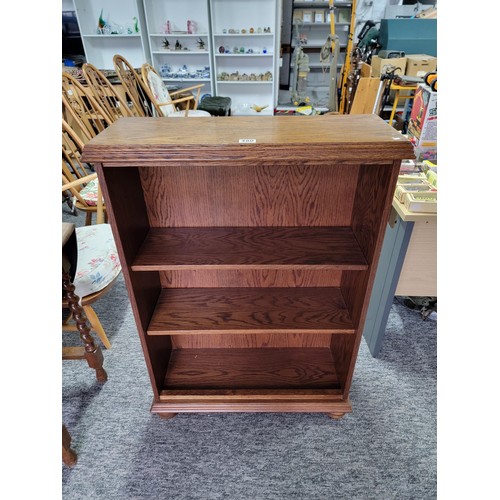 480 - Small oak 2 shelf bookcase giving nice aged patina
106cm high and 76 wide, 29cm deep