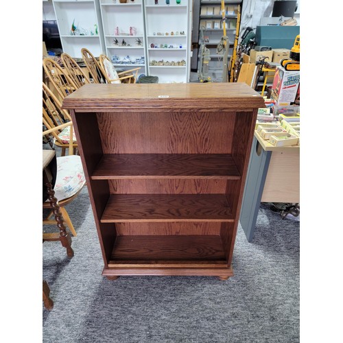 480 - Small oak 2 shelf bookcase giving nice aged patina
106cm high and 76 wide, 29cm deep