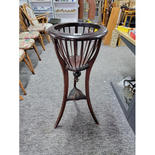 489 - Mahogany Jardiniere Edwardian with fabulous patina and in very good condition standing 89cm tall and... 