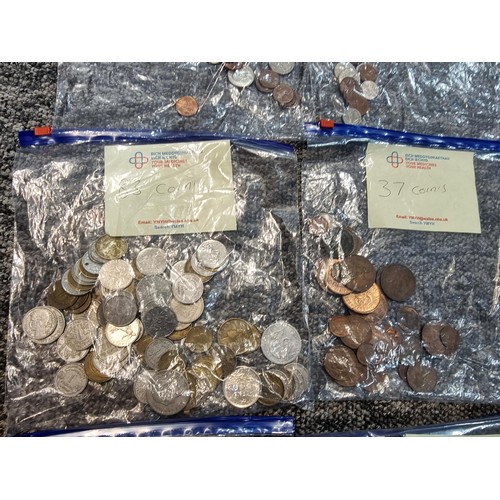 243 - A large collection of organized world coins in 17 bags all stating quantities, please study the phot... 