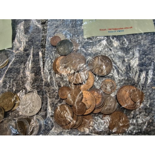 243 - A large collection of organized world coins in 17 bags all stating quantities, please study the phot... 