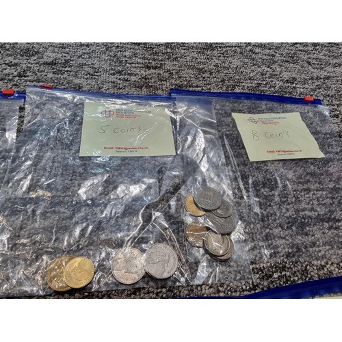 243 - A large collection of organized world coins in 17 bags all stating quantities, please study the phot... 