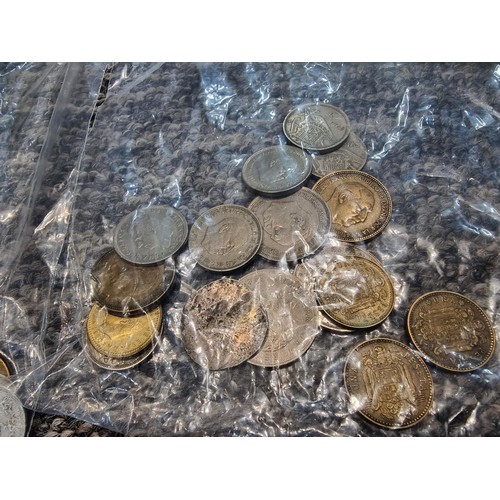 243 - A large collection of organized world coins in 17 bags all stating quantities, please study the phot... 