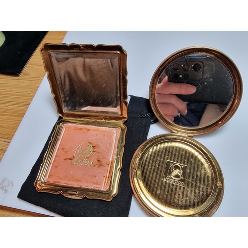 245 - 2x good quality vintage compacts by Stratton England including a compact within an enamelled floral ... 