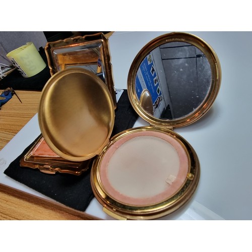 245 - 2x good quality vintage compacts by Stratton England including a compact within an enamelled floral ... 