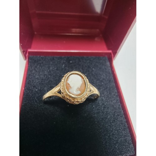 249 - A hallmarked 9ct yellow gold cameo ring with a portrait of a lady looking right in good clean condit... 