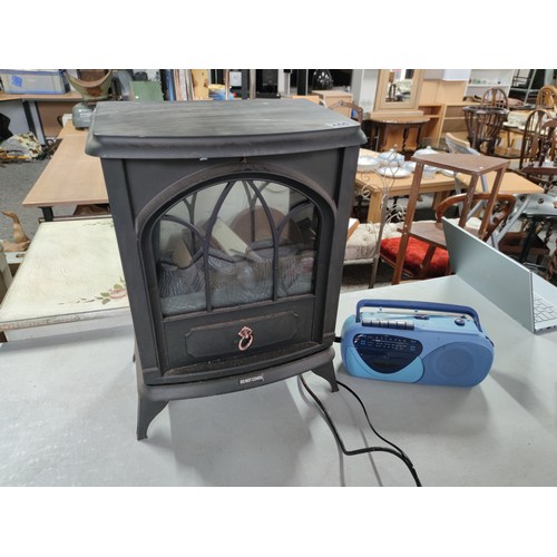 444 - 2kw electric fire with illuminated back plate along with a Morphy Richards Model RC283 electric port... 