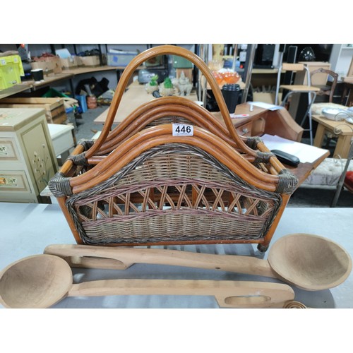 446 - A newspaper rack along with 2 handmade Bulgarian spoons along with an old Victorian carpet beater. a... 