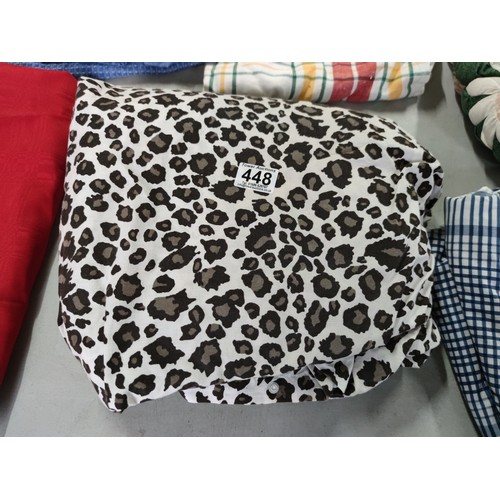 448 - Quantity of various material inc a pair of quilted cushion covers a leopard print duvet cover, blue ... 