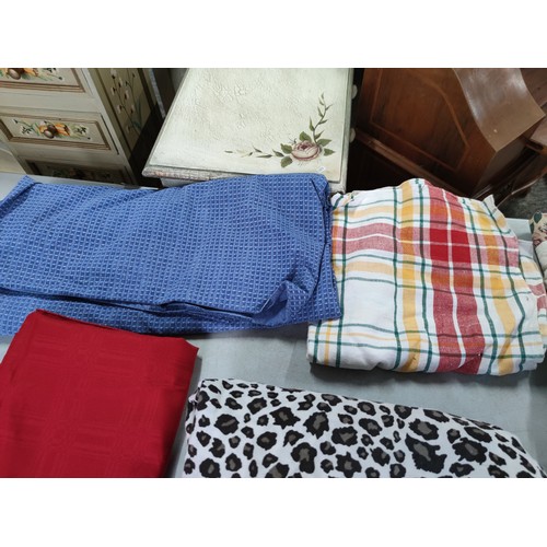 448 - Quantity of various material inc a pair of quilted cushion covers a leopard print duvet cover, blue ... 