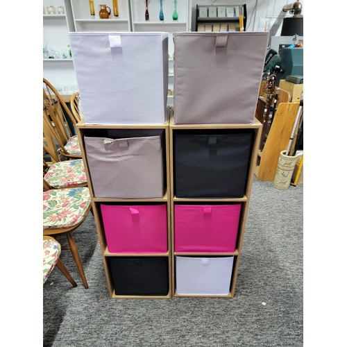 501 - 2 cube storage units complete with multi coloured baskets
104cm high and 35cm each