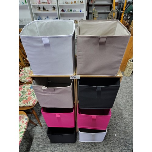 501 - 2 cube storage units complete with multi coloured baskets
104cm high and 35cm each