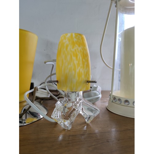 456A - 2x working bed side small yellow lamps, one with a chrome base one with a glass base, tallest stands... 