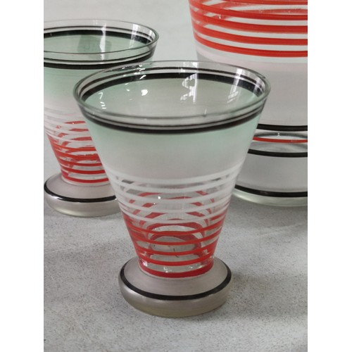 458 - Mid century 1950's glass cocktail shaker with 4 matching glasses, with red white and green stripped ... 