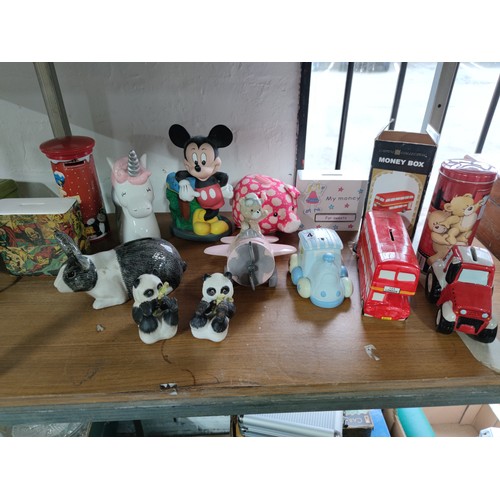 467 - Collection of 12x money boxes mostly ceramic inc rabbit formed money box, pill box, Mickey Mouse, un... 