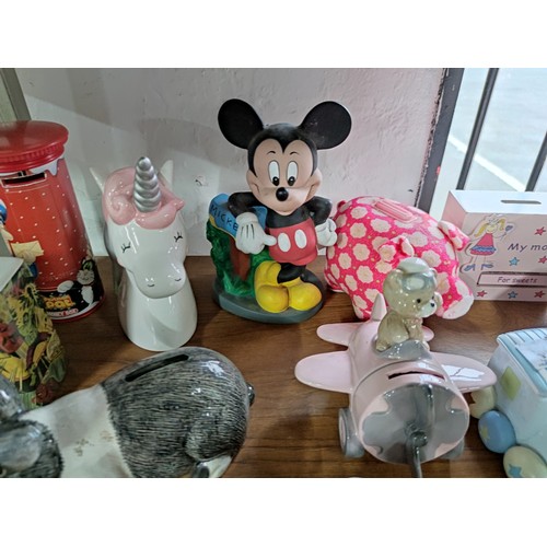 467 - Collection of 12x money boxes mostly ceramic inc rabbit formed money box, pill box, Mickey Mouse, un... 