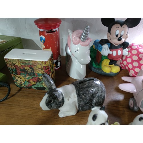 467 - Collection of 12x money boxes mostly ceramic inc rabbit formed money box, pill box, Mickey Mouse, un... 